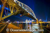 Sydney Harbour Bridge, Opera House and City decorated in video light during Vivid Sydney's 2017 festival of light, music and ideas. Sydney, New South Wales, Australia.
