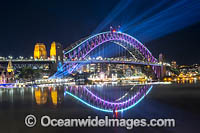 Sydney Harbour Bridge and City decorated in light during Vivid Sydney's 2018 festival of light, music and ideas. Sydney, New South Wales, Australia.