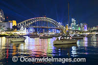 Sydney Harbour and Bridge decorated in projected light during the Vivid Sydney 2023 festival of light, music and ideas. Sydney, New South Wales, Australia.