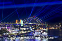Sydney Harbour and Bridge decorated in projected light during the Vivid Sydney 2023 festival of light, music and ideas. Sydney, New South Wales, Australia.