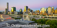 Brisbane City during sunset hour, viewed from South Bank, a popular tourist recreational area on the Brisbane River. Brisbane, Queensland, Australia.