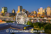 Brisbane City during sunset hour, viewed from South Bank, a popular tourist recreational area on the Brisbane River. Brisbane, Queensland, Australia.