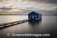 Sunrise at Crawley Edge Boatshed, also known as the Blue Boat House, on the Swan River. Perth, Western Australia.