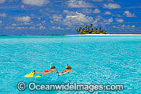 Snorkel divers tropical Island Photo - Gary Bell