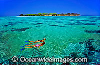 Snorkelers island lagoon Photo - Gary Bell